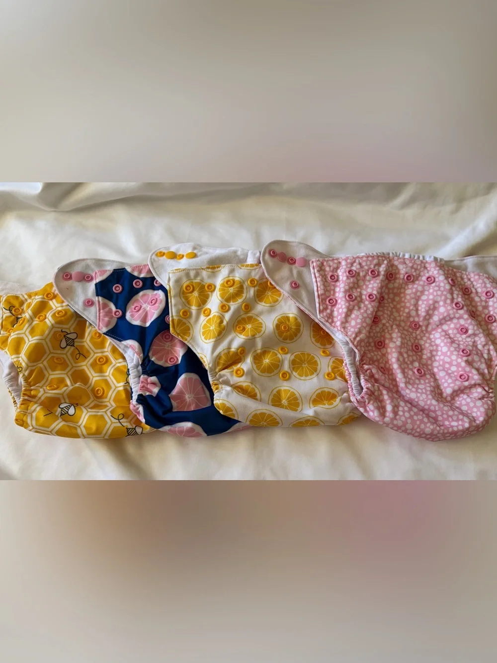 Nora’s Nursery cloth diapers lot 4 (pocket shells + bamboo inserts) Citrus bee
